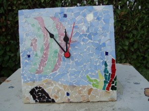 orologio con mosaico pesci